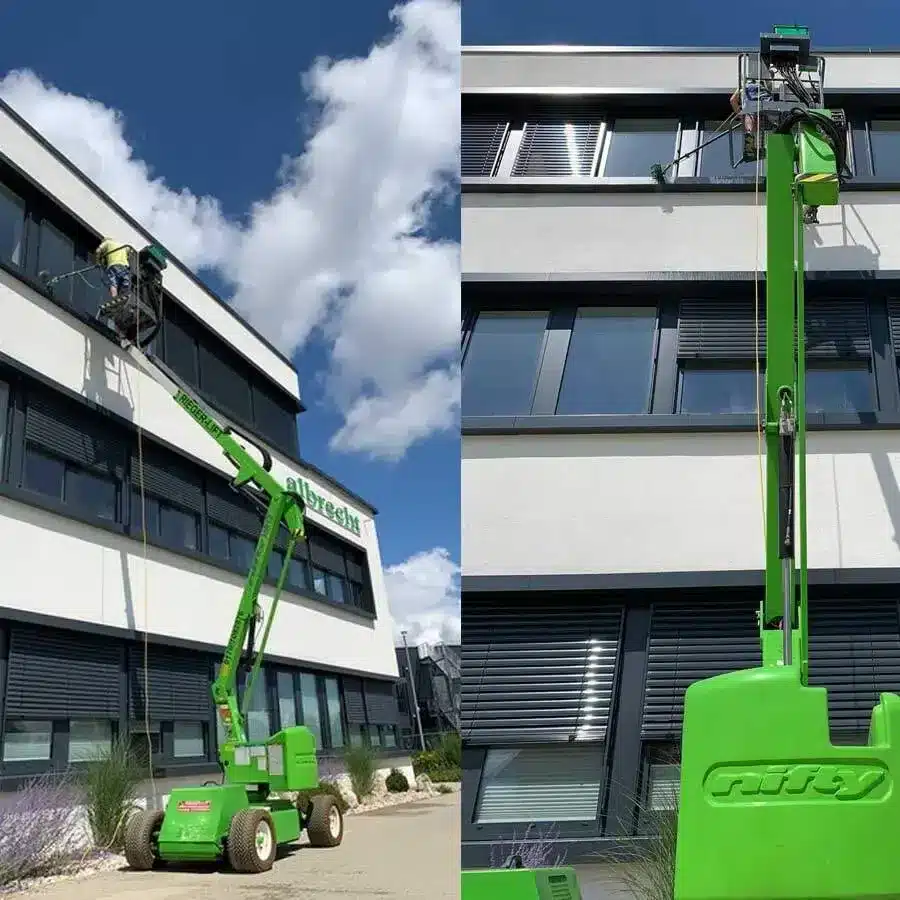 Glasreinigung mit Hubarbeitsbühne an einem Gebäude in Bernau